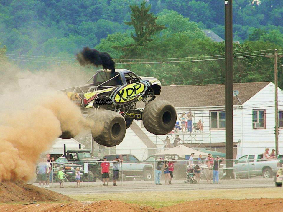 XDP Diesel Monster Truck performing a jump
